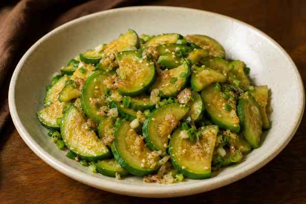 Finished Hobak Bokkeum Stir-Fried Zucchini presented in a warm Korean dining setting.